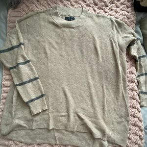 Tan sweater with sleeve strips